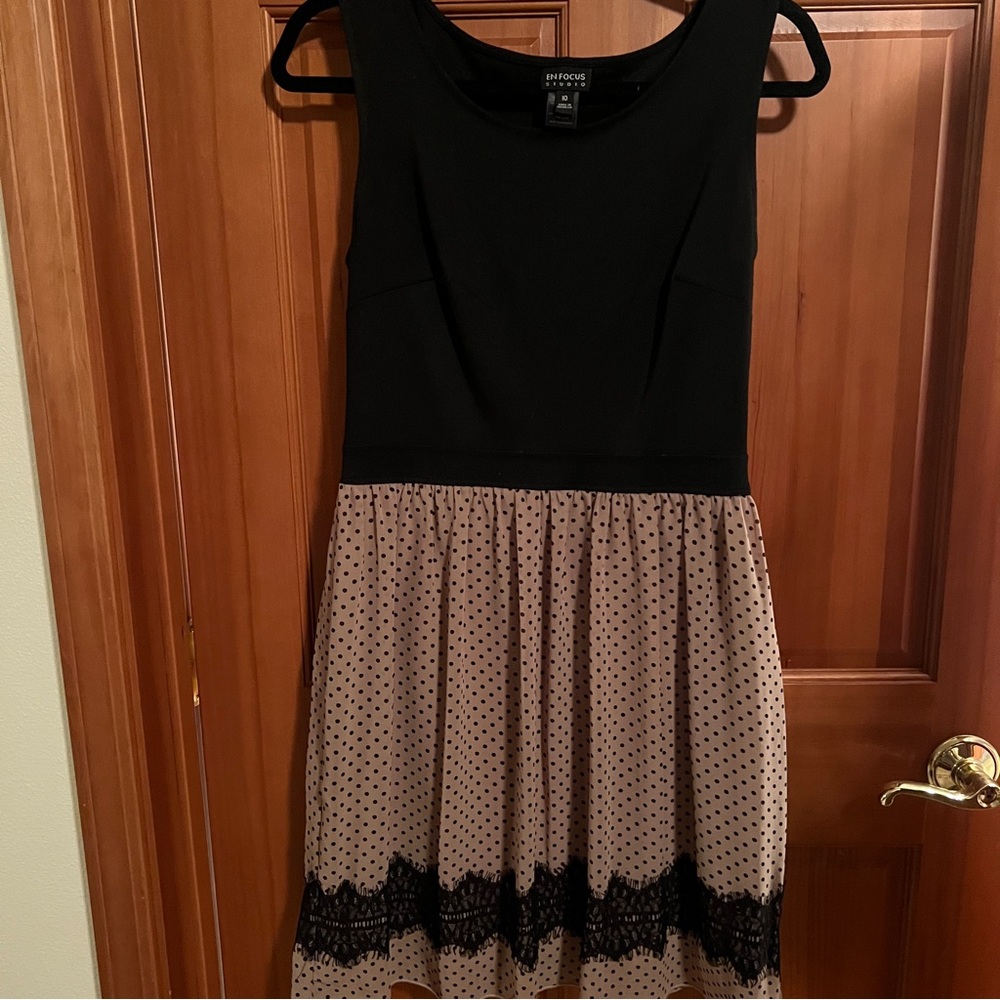 En Focus Black and Beige A Line dress with polka dot skirt with lace appliqué